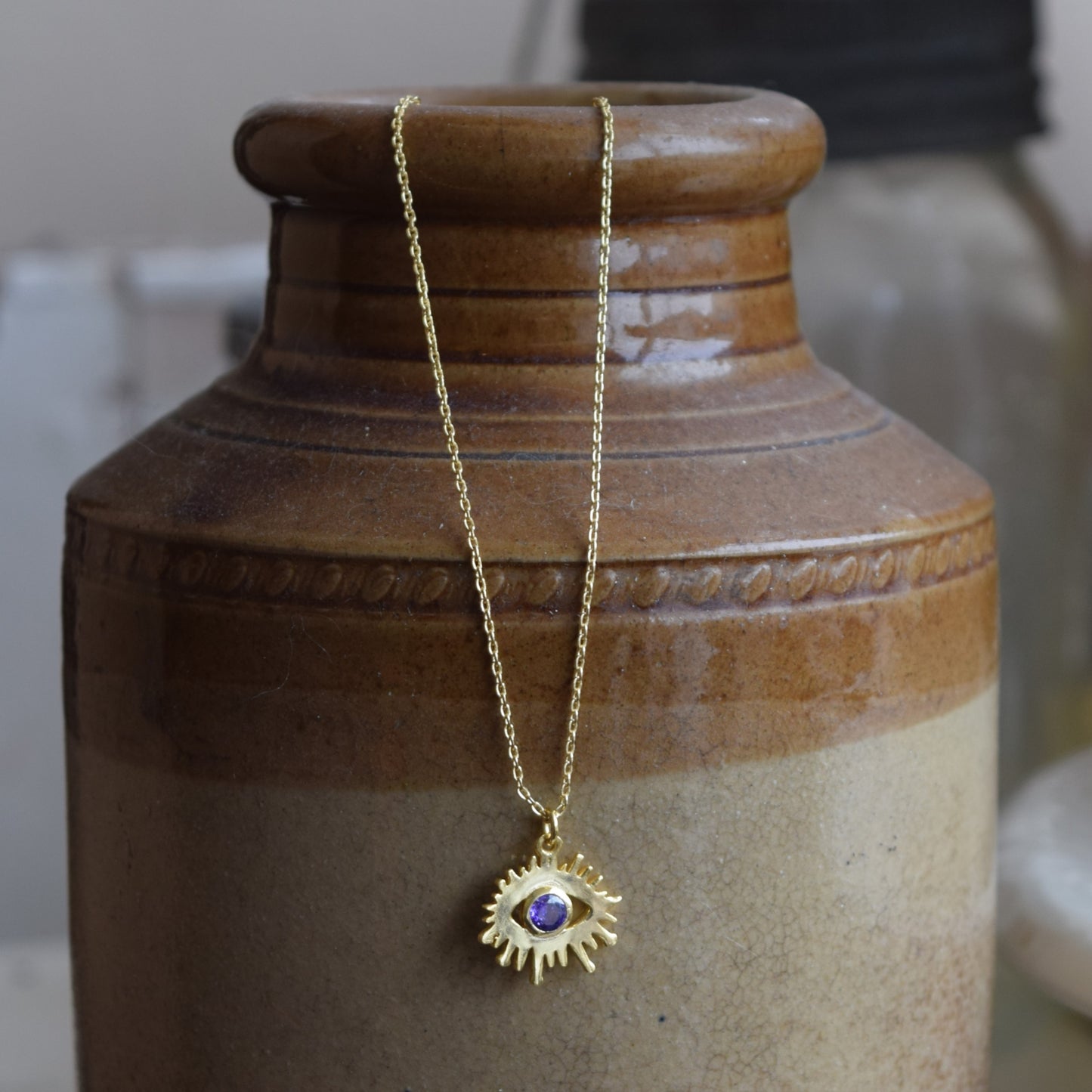 Gold Evil Eye Amethyst Stone